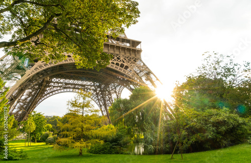 Base of Eiffel Tower lit by Bright Sun