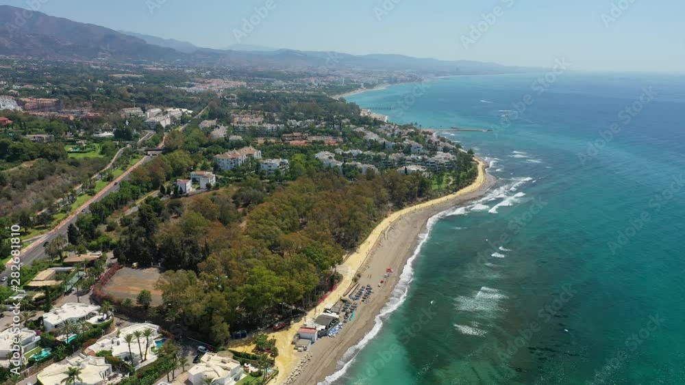 Aerial view of cityscape of Marbella, famous summer resort city and tourist destination in Costa del Sol, beaches and Mediterranean Sea - landscape panorama of Andalusia from above, Spain, Europe Aerial view of cityscape of Marbella, famous summer resort city and tourist destination in Costa del Sol, beaches and Mediterranean Sea - landscape panorama of Andalusia from above, Spain, Europe