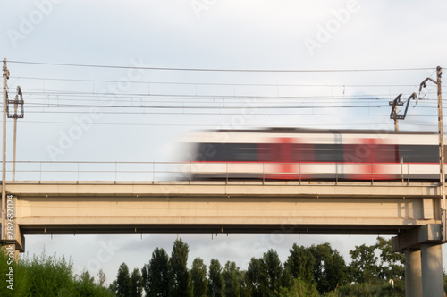 Train over a concrete bridge
