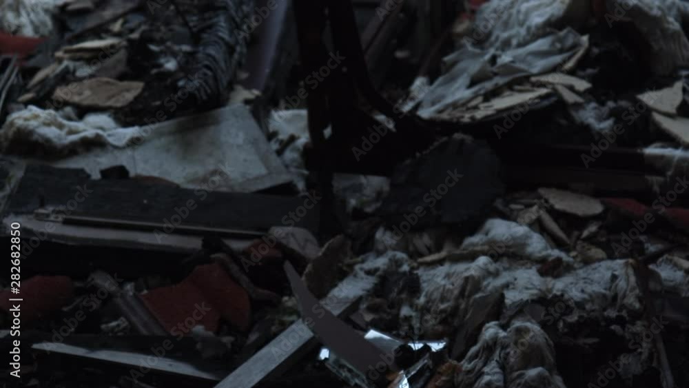 Tilt Up Revealing Pieces Of Broken Mirror And Ruins Of Burned Building.