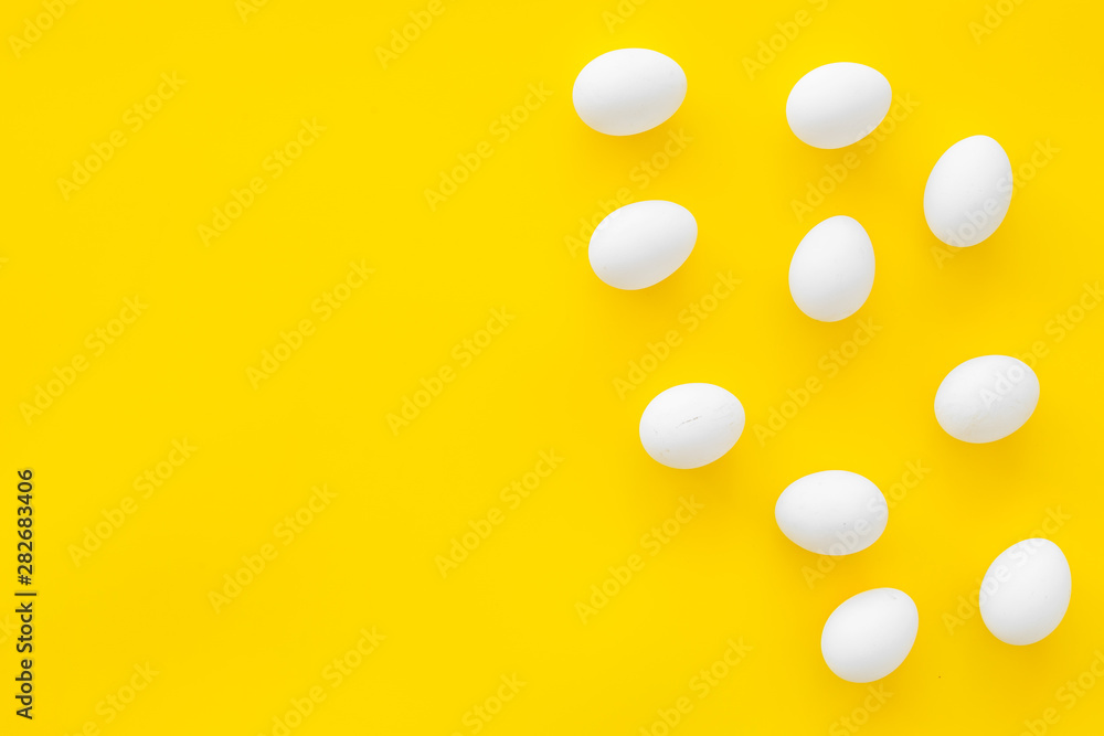 Farm products with eggs on yellow background top view mock up Farm products with eggs on yellow background top view mock up