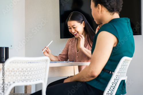Businesswoman smiling in a meeting