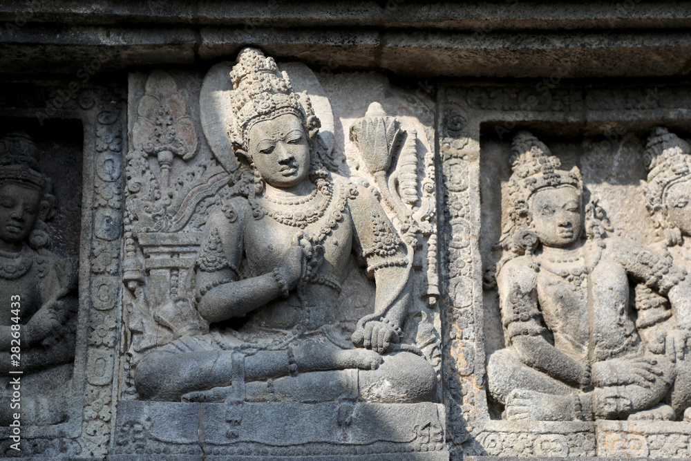Jogjakarta, Indonesia - June 23, 2018: Carving on the outside of the main temple at the Hindu temple complex of Prambanan, near Jogyakarta