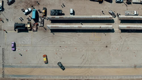 drifting cars seen from above drone eye aerial shot ortographic 