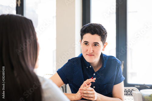 Businessman having conversation with colleague