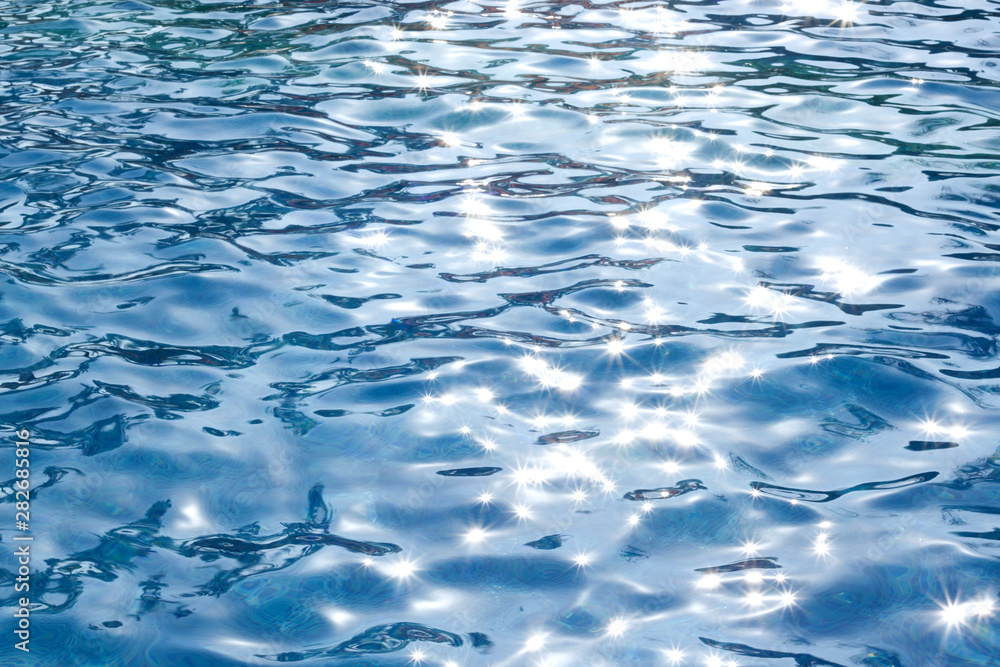 Pool water with sun glare on the surface Pool water with sun glare on the surface