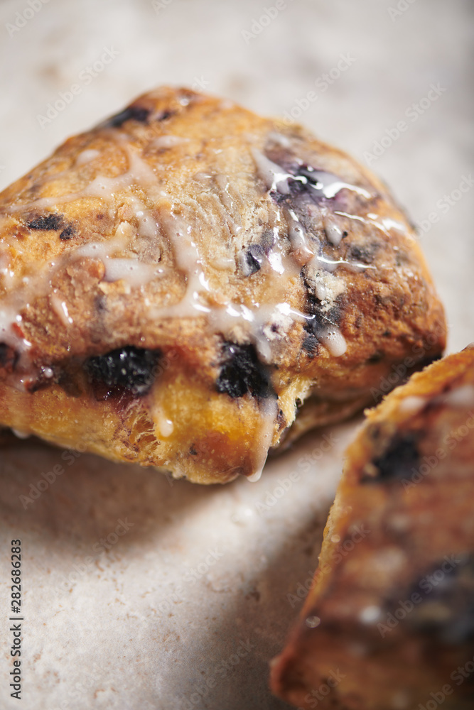 Closeup of Blueberry Scone with Icing 