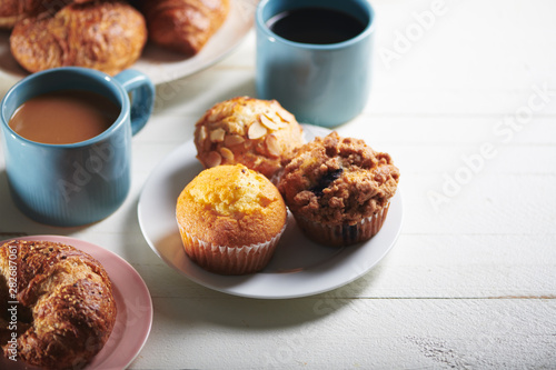 Plate of Muffins and Breakfast Baked Goods with Coffee