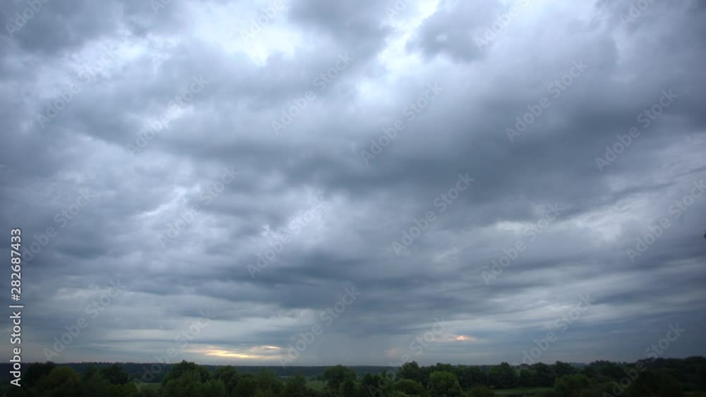 Video time lapse of beautiful gloomy nature of countryside in early morning time. Sunrise and cloudy sky wide angle shoot. Video time lapse of beautiful gloomy nature of countryside in early morning time. Sunrise and cloudy sky wide angle shoot.