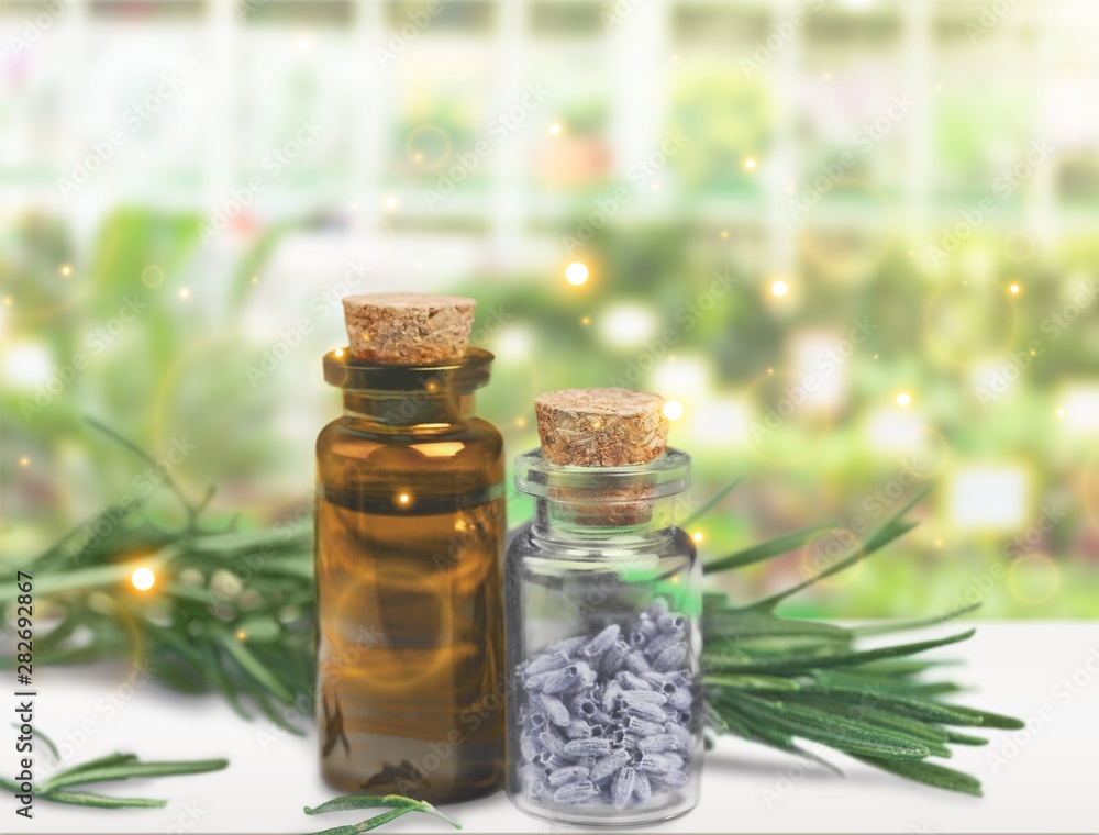 Rosemary and lavender essential oil isolated on white Rosemary and lavender essential oil isolated on white
