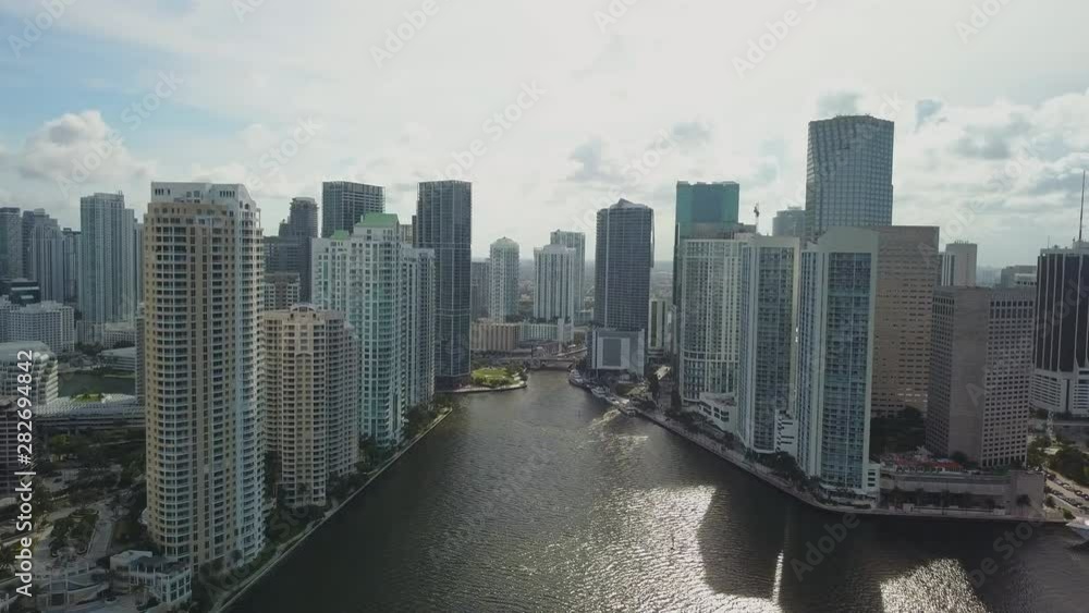 Aerial drone shot flying by skyscraper in downtown Miami, FL Aerial drone shot flying by skyscraper in downtown Miami, FL