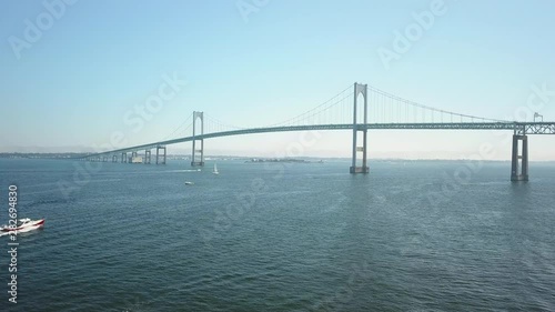 Wallpaper Mural Aerial drone shot flying over the water towards the Claiborne Bridge in Newport, Rhode Island. Torontodigital.ca