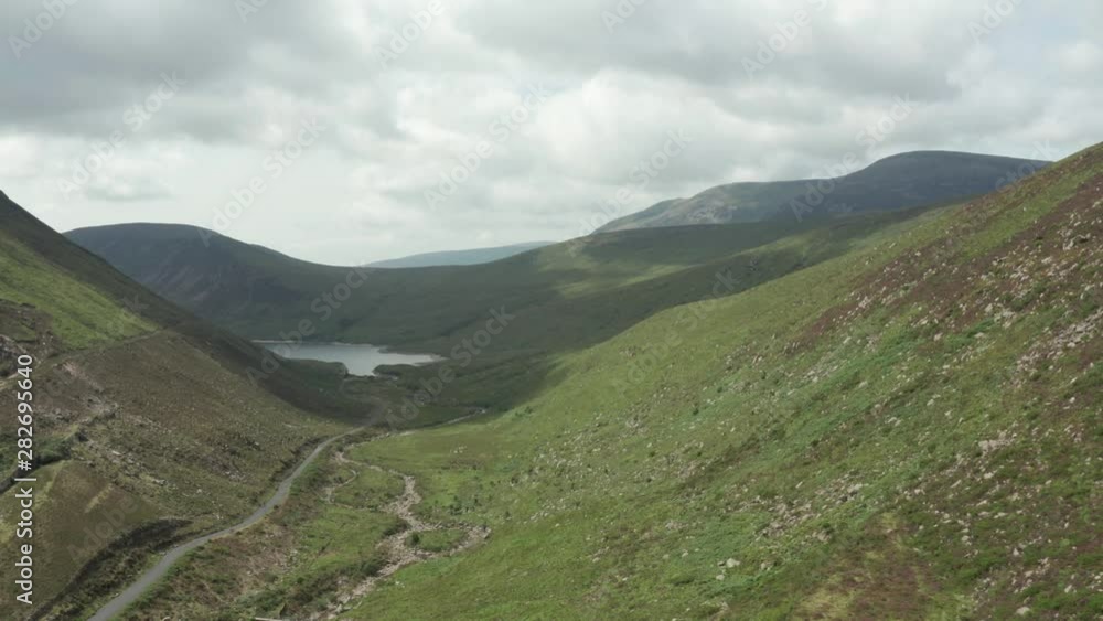 Aerial Flight Over Silent Valley Mountain Park area countryside Northern Ireland. Hiking And Tourism Concept Aerial Flight Over Silent Valley Mountain Park area countryside Northern Ireland. Hiking And Tourism Concept