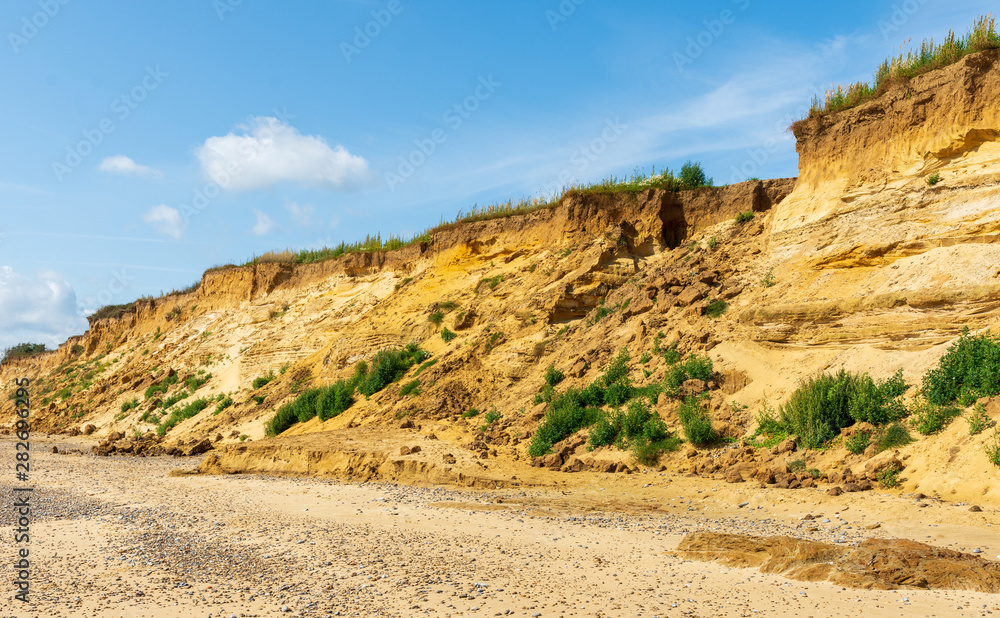 A rock fall has left a large gap in the cliffs at Covehithe Suffolk, UK A rock fall has left a large gap in the cliffs at Covehithe Suffolk, UK