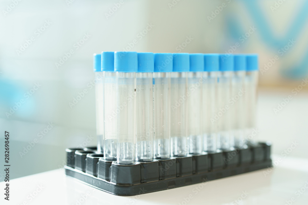 Empty glass test tubes in the stand. Medical Blood test tubes. Empty glass test tubes in the stand. Medical Blood test tubes.