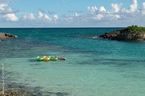 boats floating on blue water