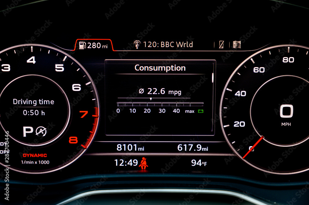 Fuel consumption display in instrument cluster of modern car.  Fuel economy is one of the most important factors to consider when buying a new car. Car gas mileage theme, fuel consumption concept