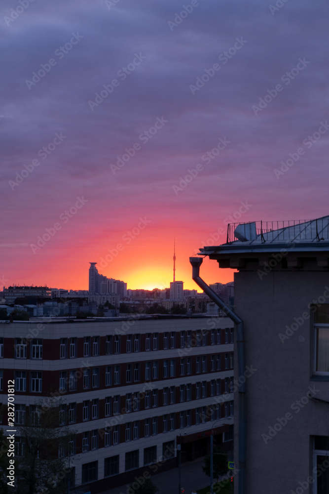 Television tower Ostankino in Moscow against sunset cloudy sky in background. Television tower Ostankino in Moscow against sunset cloudy sky in background.