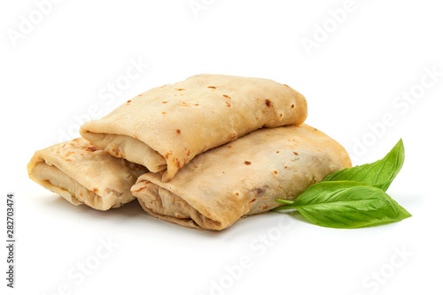 Stuffed pancakes, crepes with filling, isolated on white background