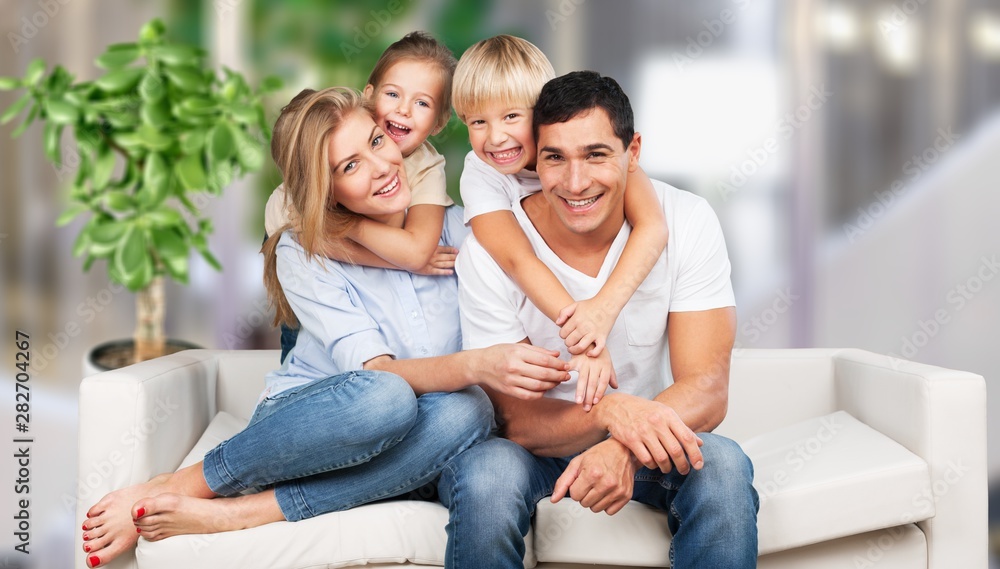 Beautiful smiling family on background Beautiful smiling family on background