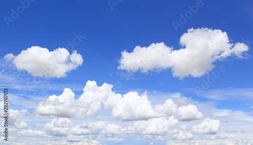 Fototapeta Naklejka Na Ścianę i Meble -  Blue sky background with tiny clouds.