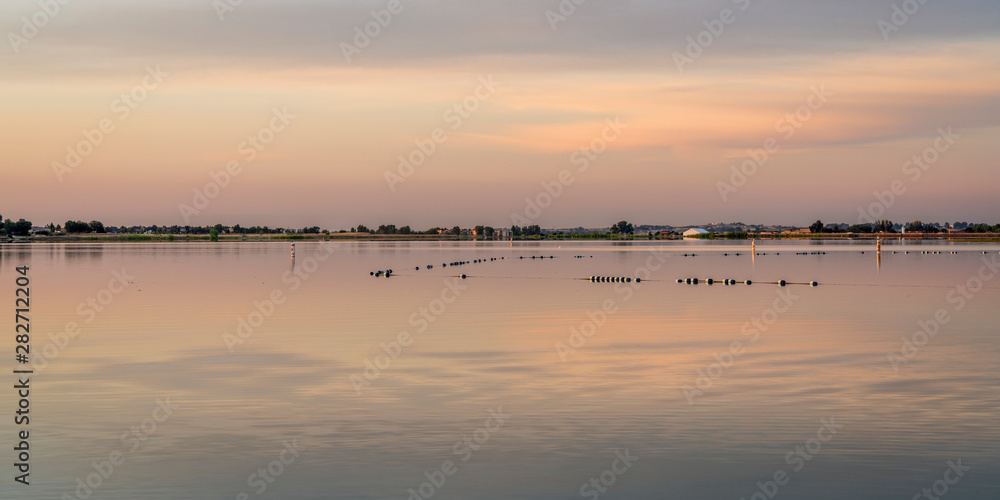 lake swimming beach at dawn