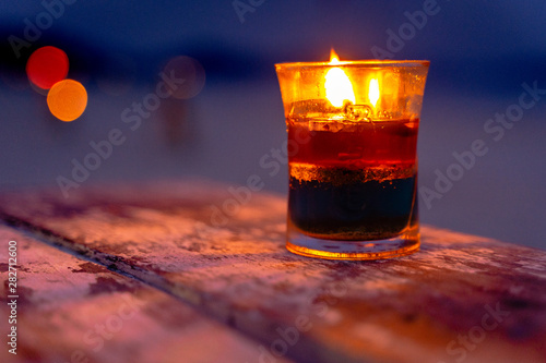 Candle at the beach of langkawi on a table