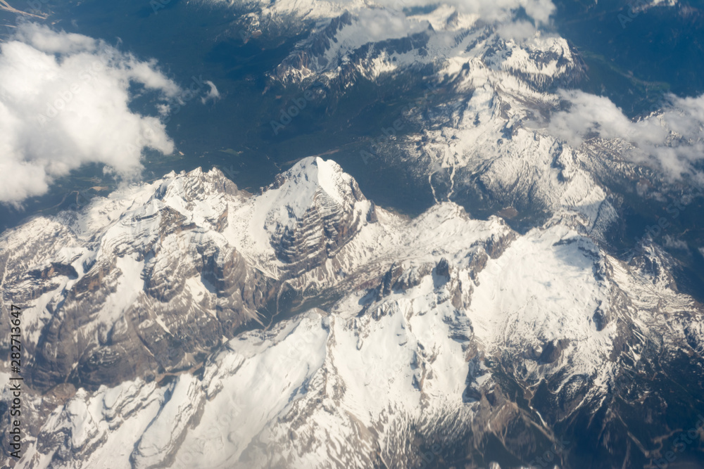 View of the mountain range of the Alps from the airplane