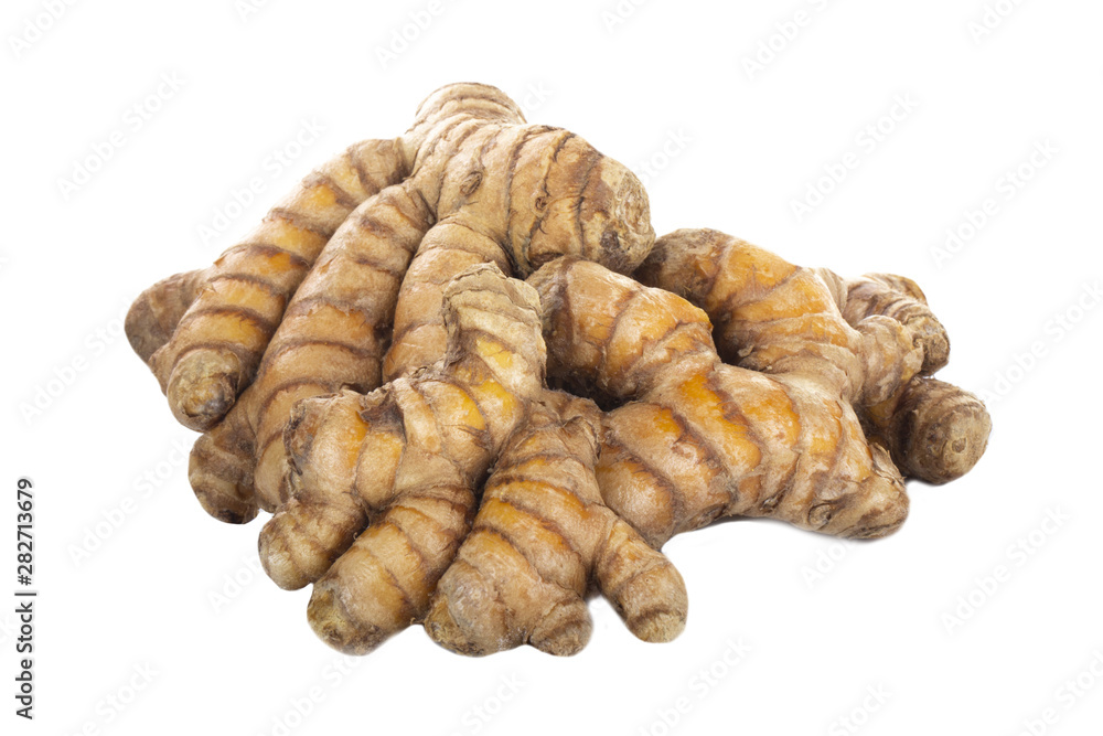 heap of turmeric roots isolated on white background heap of turmeric roots isolated on white background