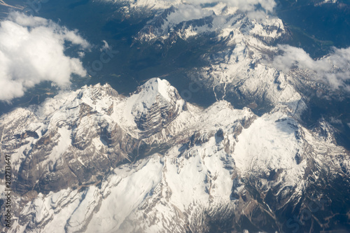 View of the mountain range of the Alps from the airplane