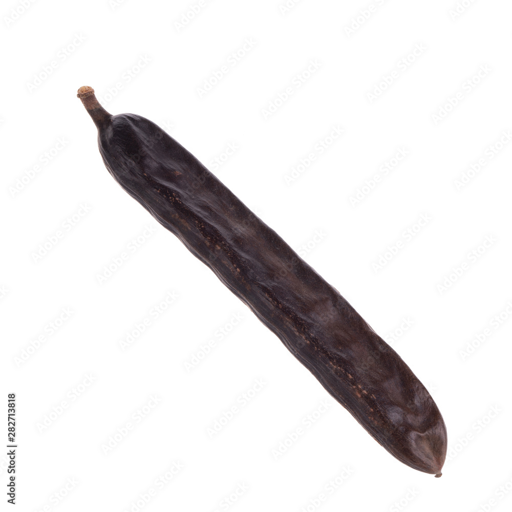 dried long carob pod isolated on white background dried long carob pod isolated on white background