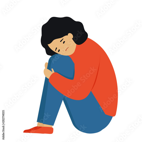 The sad girl sits with her head in her lap. The lone woman shrank in fear