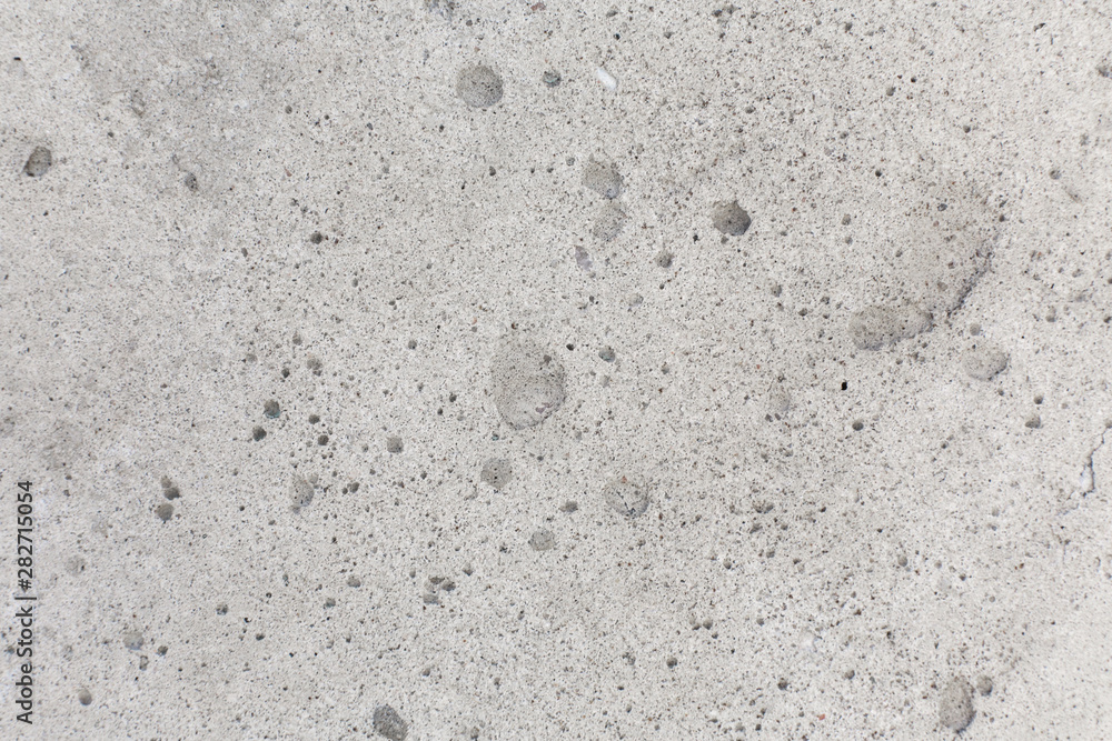 Fototapeta premium Close up texture of loose cement wall