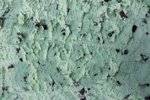 Top view of mint flavour ice cream with chocolate flakes in box