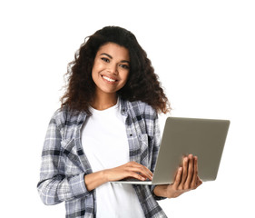 Portrait of cute African-American woman with laptop on white background