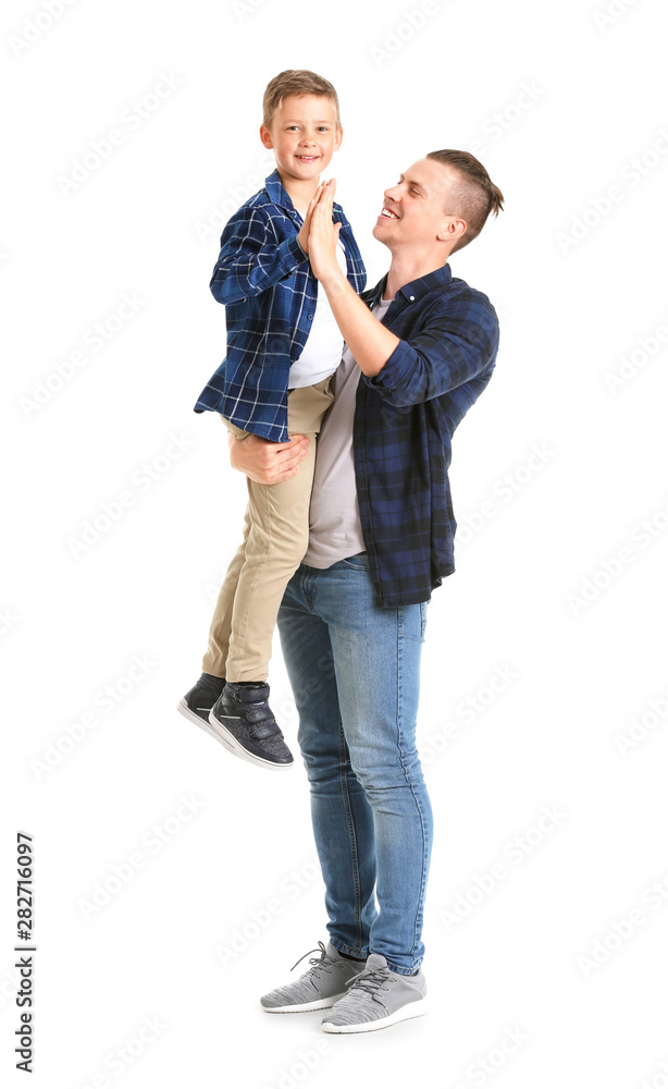 Portrait of happy father and son on white background Portrait of happy father and son on white background