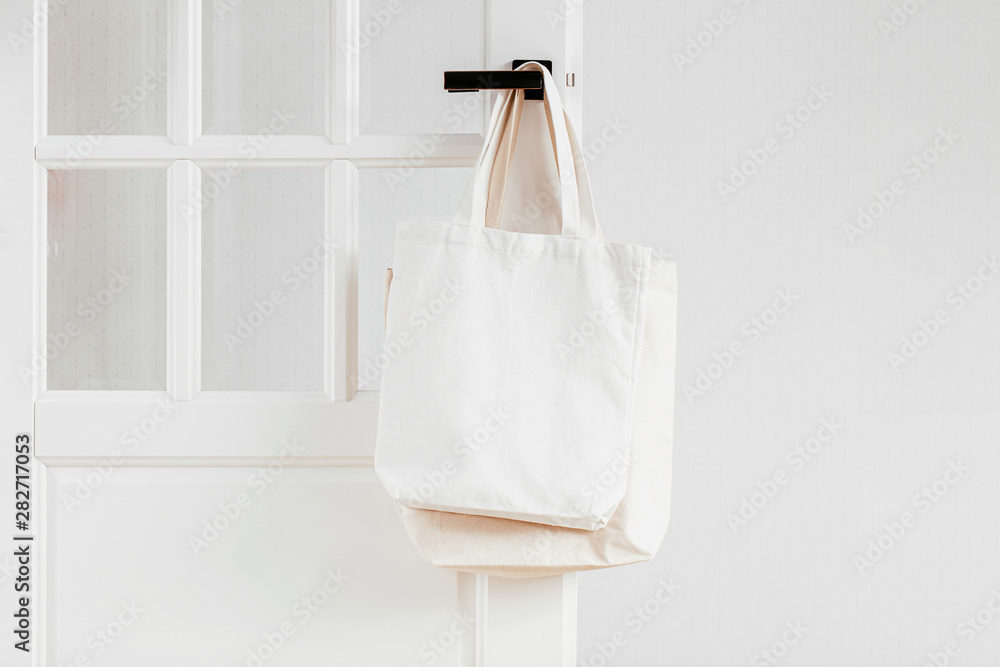 White eco bag mockup. Blank Shopping sack with copy space. Canvas tote bag.  Eco friendly / Zero waste concept. Stock-bilde | Adobe Stock
