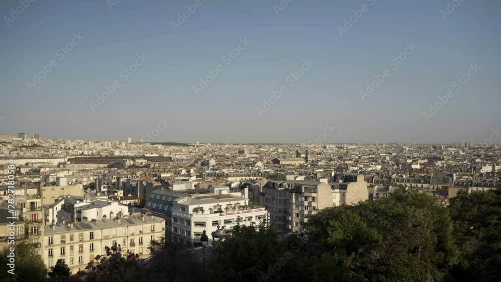 Panoramic city view of Paris, Paris on a sunny evening. France is full of beautiful buildings. Left to right pan real time establishing shot. City view Panoramic city view of Paris, Paris on a sunny evening. France is full of beautiful buildings. Left to right pan real time establishing shot. City view