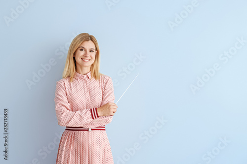 Beautiful female teacher wi...