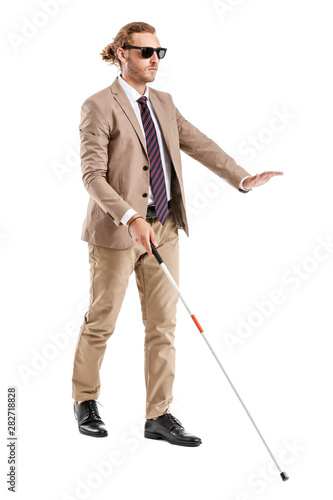 Blind young man on white ba...