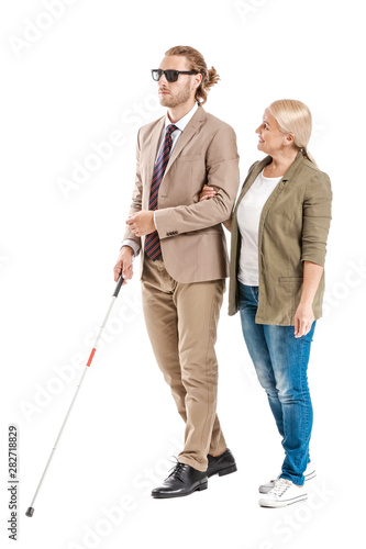 Blind young man with mother...