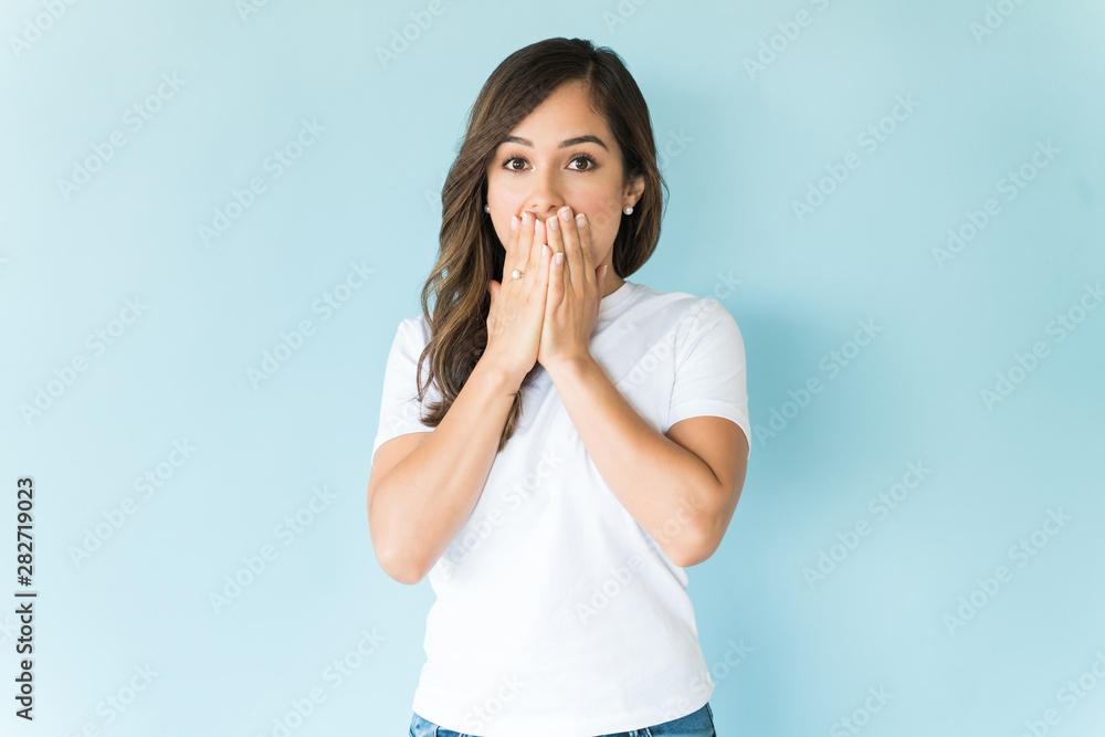 Shocked Woman Over Blue Background Shocked Woman Over Blue Background