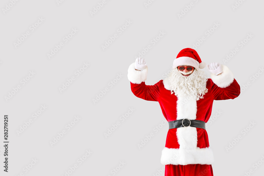 Portrait of cool Santa Claus on light background Portrait of cool Santa Claus on light background