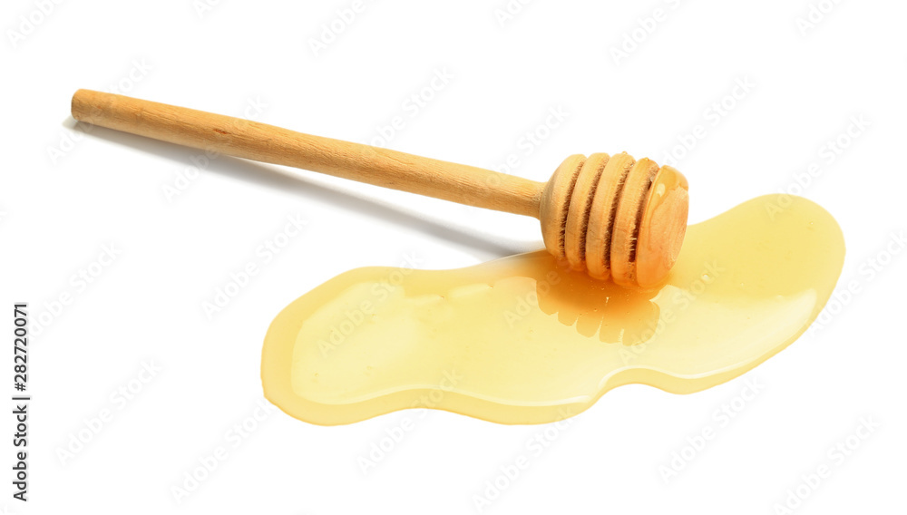 Wooden honey dipper on white background Wooden honey dipper on white background