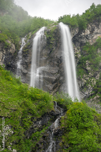 Fototapeta Naklejka Na Ścianę i Meble -  View of the waterfall in Caucasian mountains