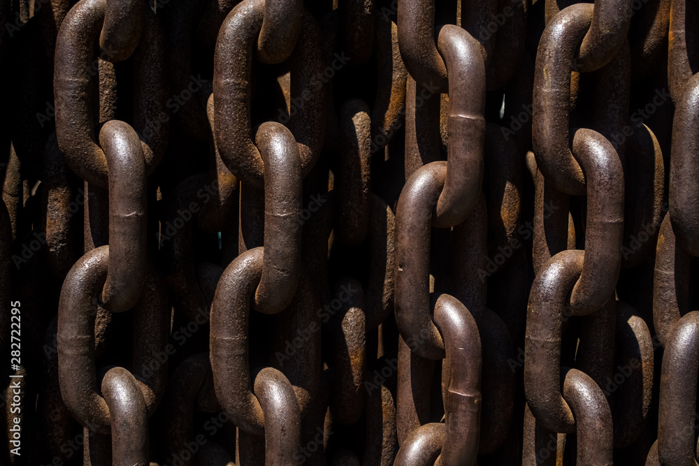 Background or texture from big metal and rusty chains and links. Background or texture from big metal and rusty chains and links.