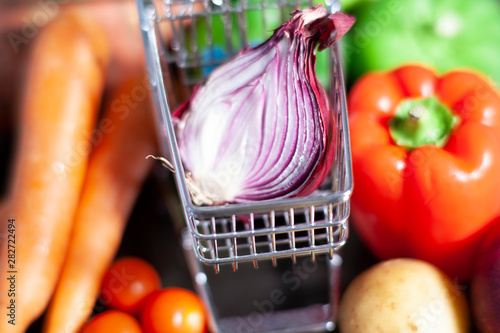 Big vegan shopping for huge vegetables photo