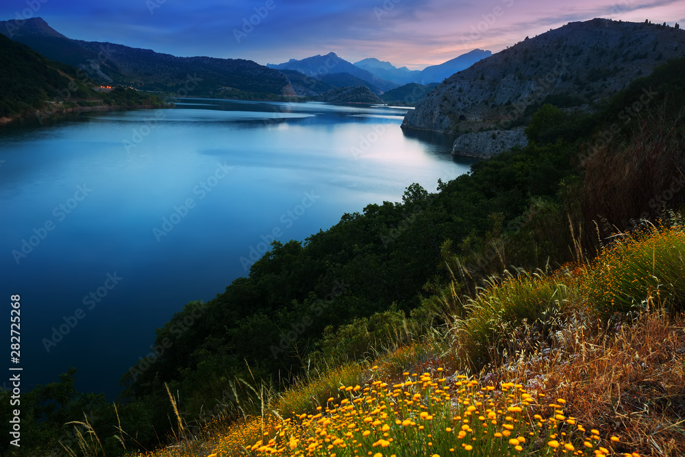 mountains reservoir  in summer twilight - obrazy, fototapety, plakaty 