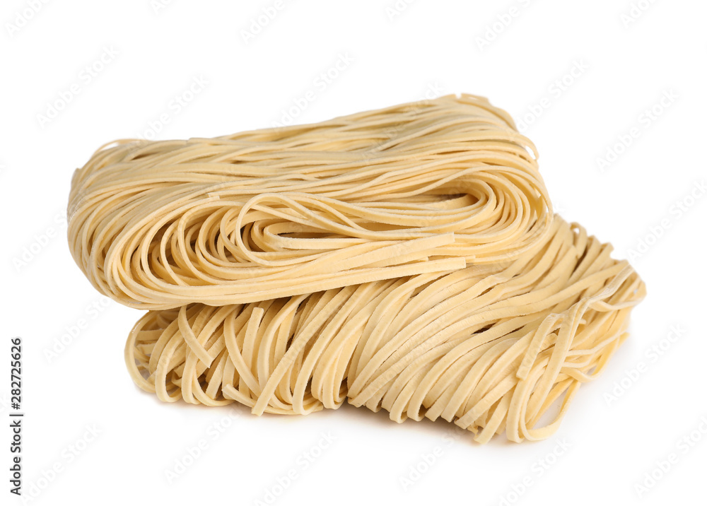 Blocks of raw egg noodles isolated on white Blocks of raw egg noodles isolated on white