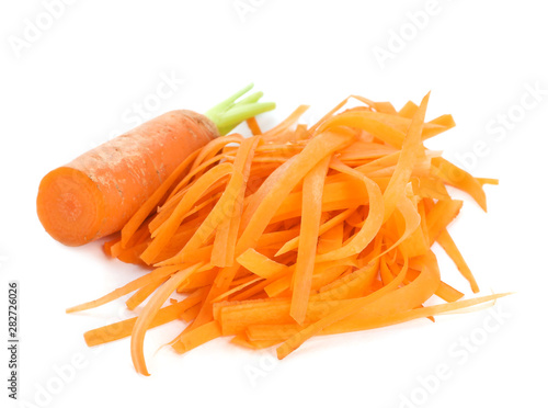 Tasty raw shredded carrot isolated on white